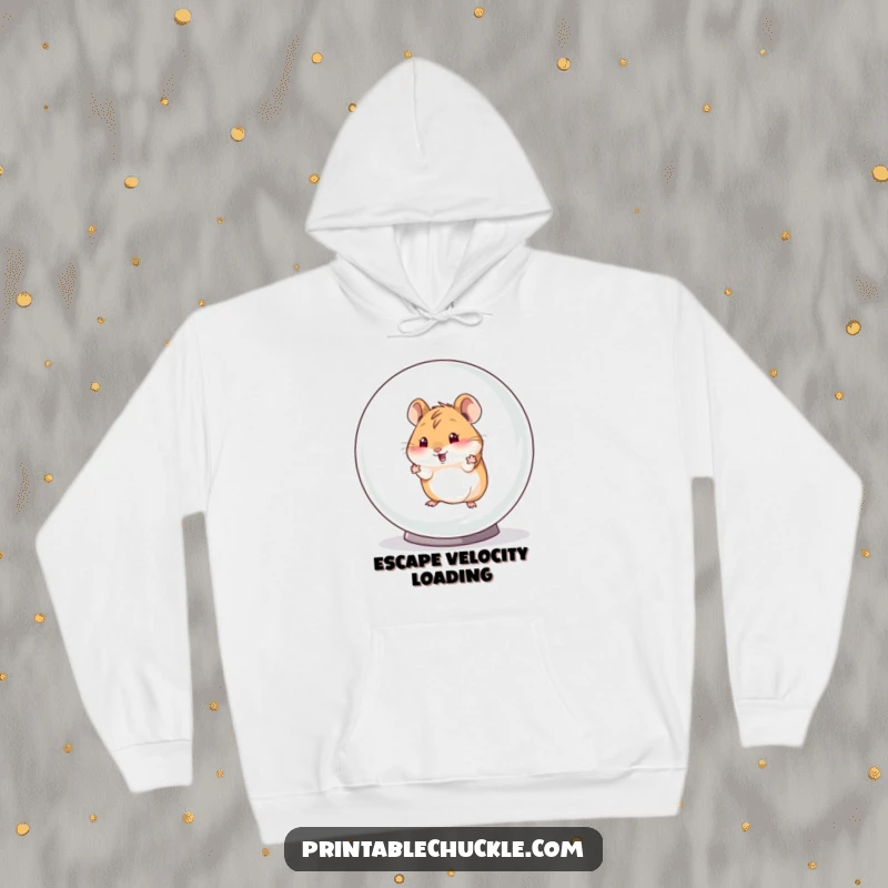 Funny hoodie with a determined hamster attempting escape from a humongous hamster ball, offering warmth and a hearty laugh.