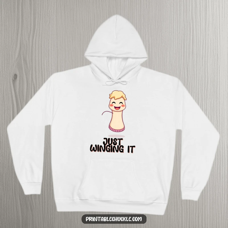 Funny hoodie featuring an ecstatic sock puppet with its string trailing behind, perfect for cozy, playful moments.