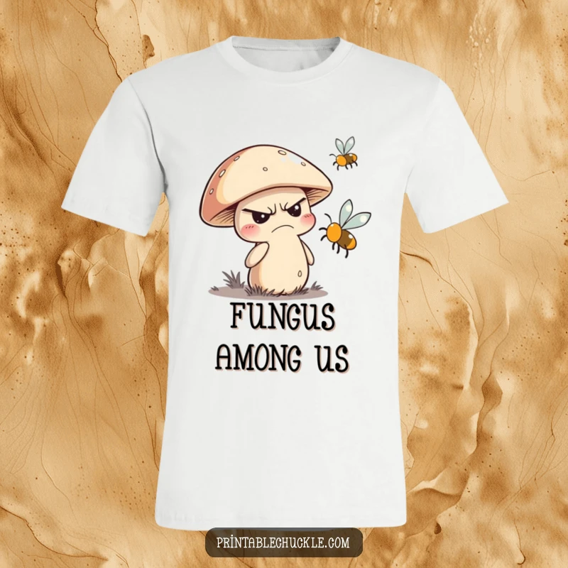 Funny t-shirt graphic of a grumpy mushroom character batting away a buzzing fly with an annoyed expression.