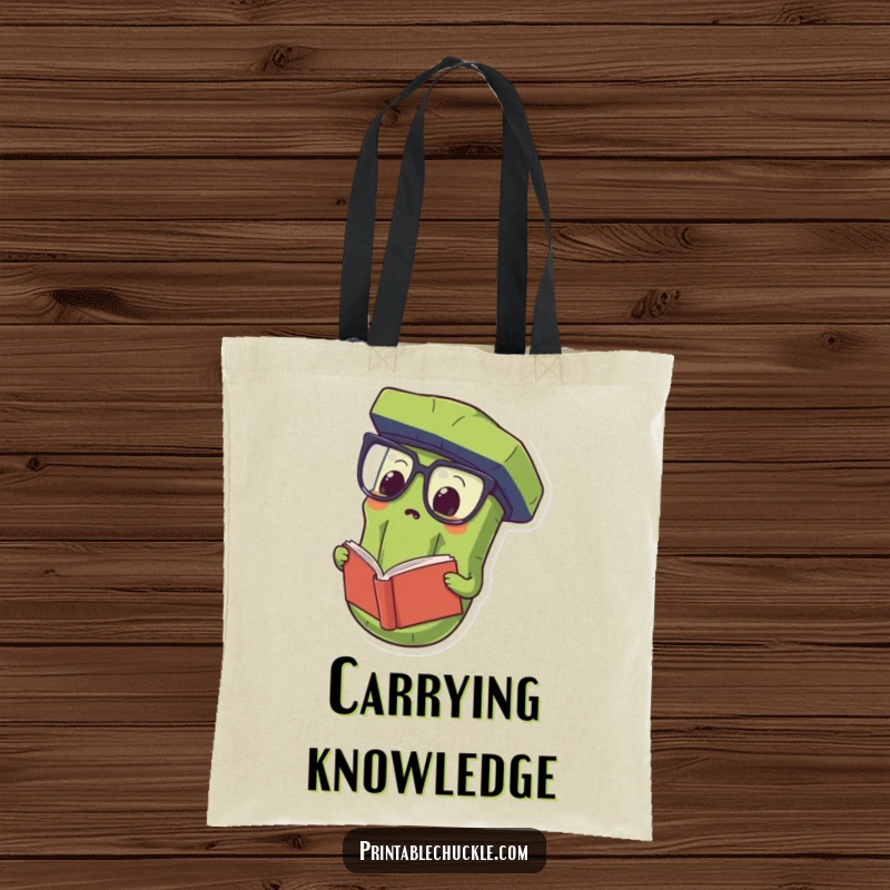 Funny Tote Bag showcasing a proud pickle wearing oversized spectacles and reading a book upside down, perfect for book lovers.
